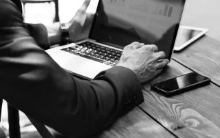 Miller Law Group attorney working on a laptop