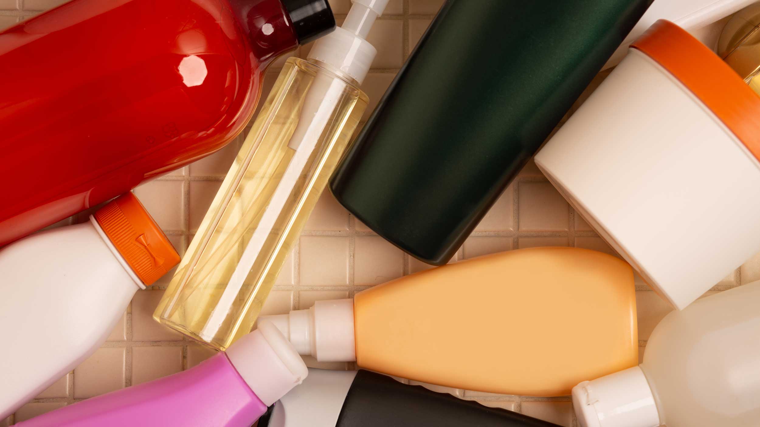 Lots of hair product bottles